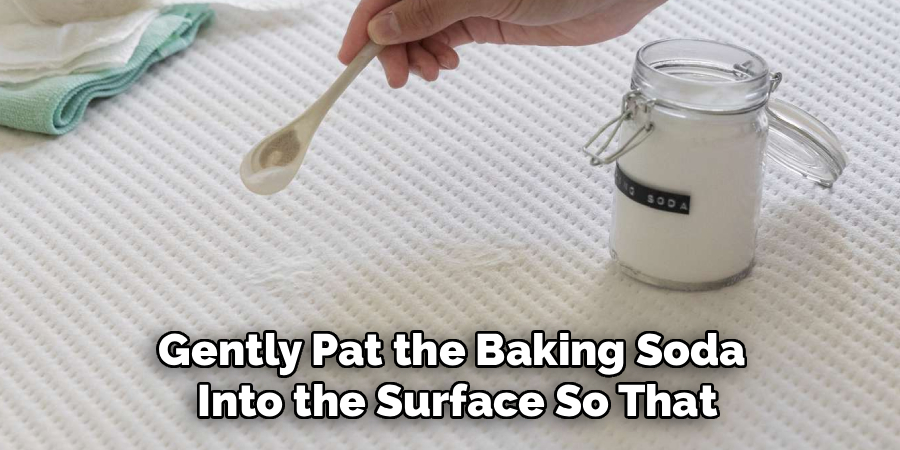 Gently Pat the Baking Soda
Into the Surface So That